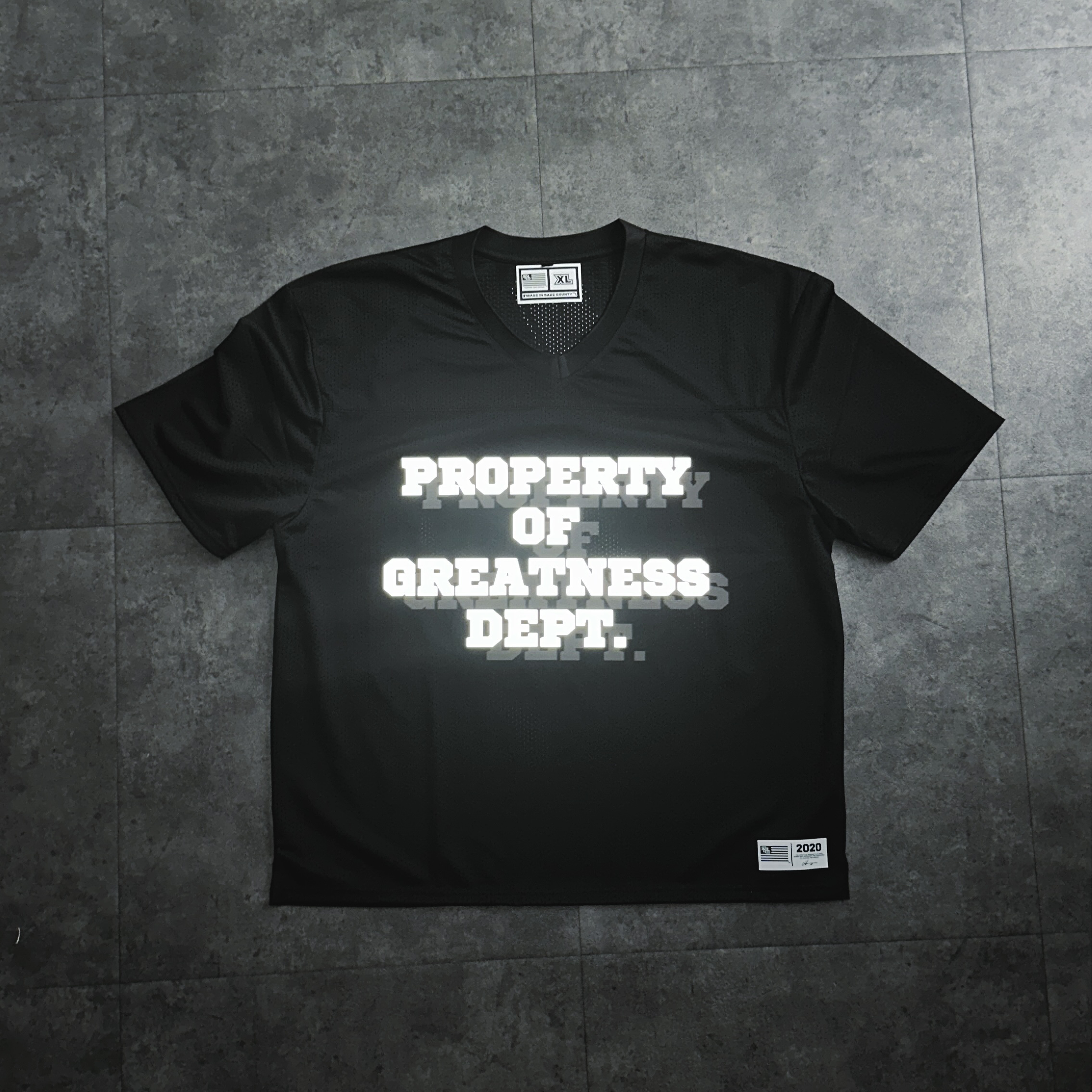 PROPERTY OF GREATNESS DEPT. REFLECTIVE PRACTICE JERSEY [1OF1]